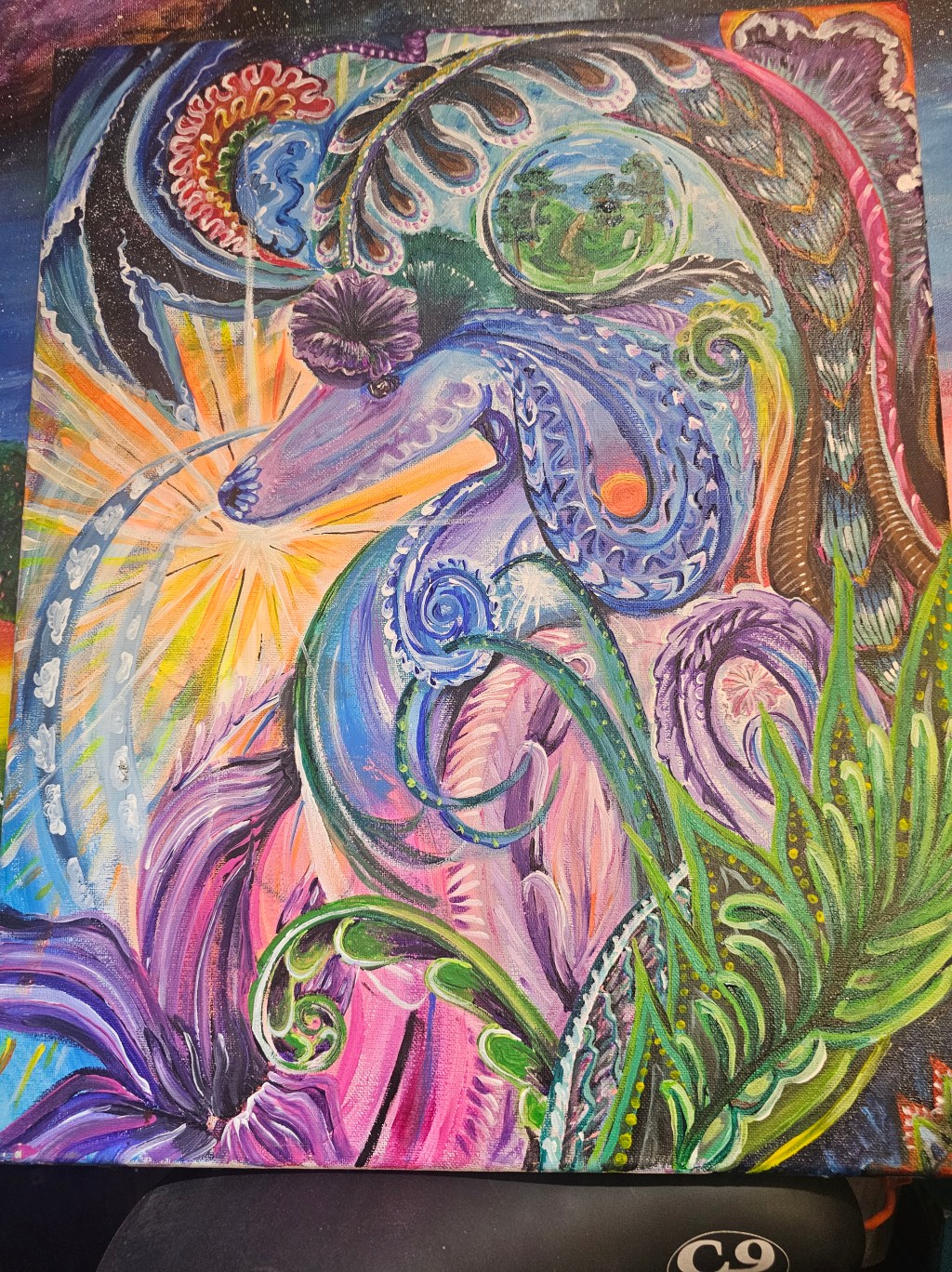 Colorful original canvas with a stylized octopus-like sea creature amid energetic swirls of blue, purple, pink, green, and orange.